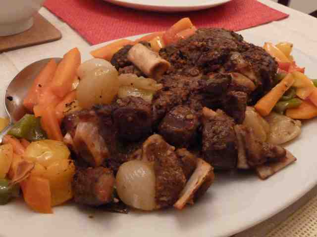 Shoulder lamb roast flanked with roasted veggies & the mandatory baby onions